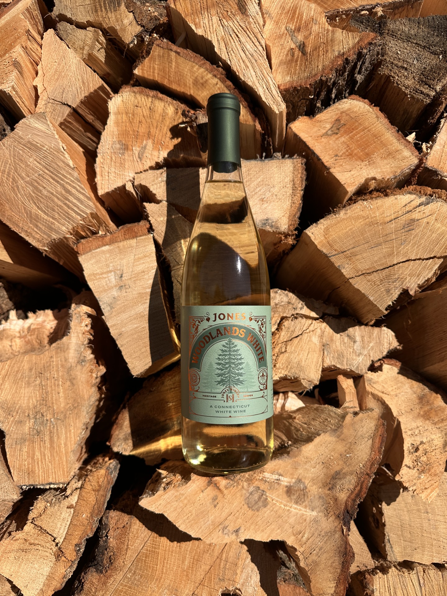 Woodlands White On Wood Pile