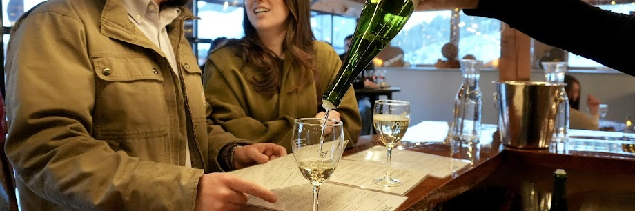Guests enjoying themselves at the tasting bar.
