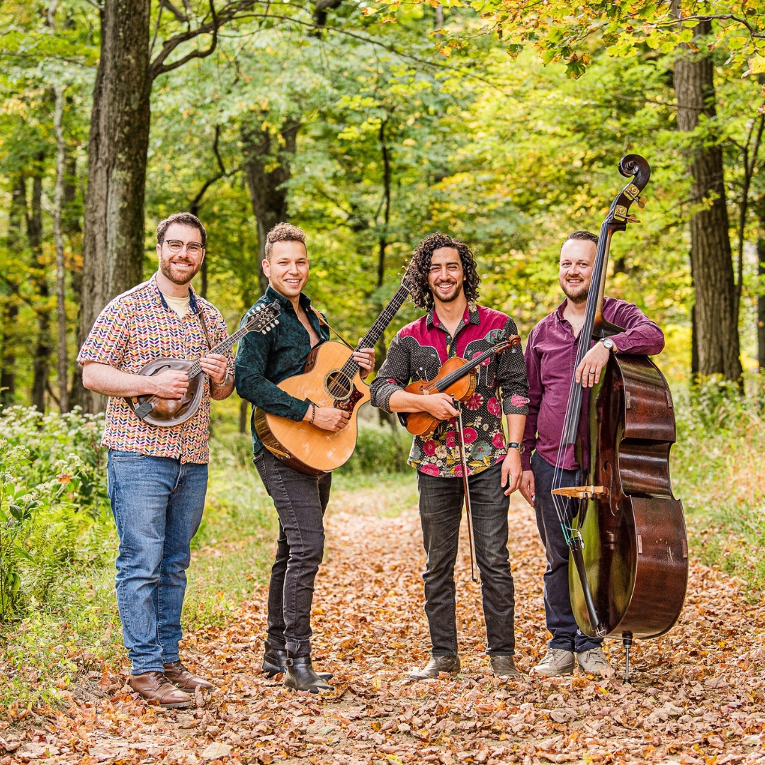 Charlie Widemer Band in the woods with their instruments