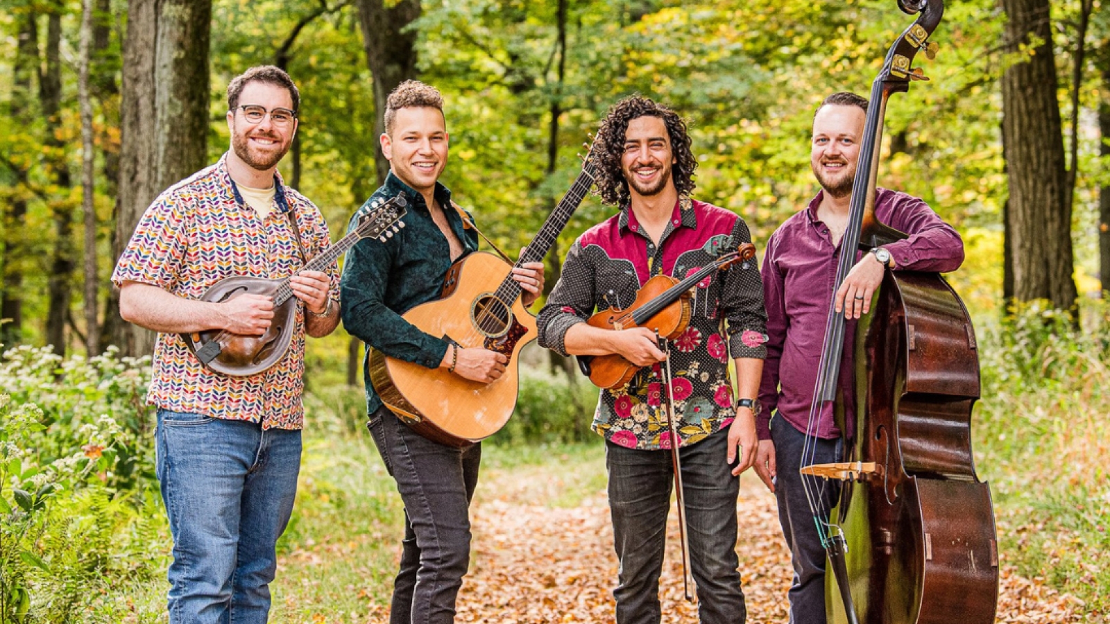 Charlie Widemer Band in the woods with their instruments