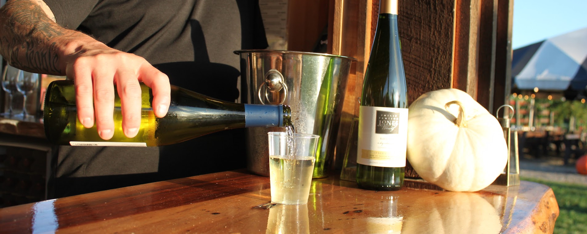 Staff Pouring Glass of Wine 