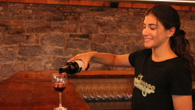 staff pouring wine